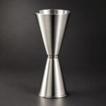 Japanese Jigger, 1 and 2 oz, Stepped, shown on a plain studio background