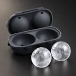 Sphere Ice Mould, 60 mm, Set of Two, shown on a plain studio background